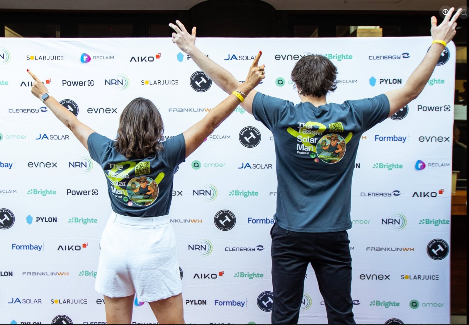 The Tassie Solar Man podcast shirts at an industry event