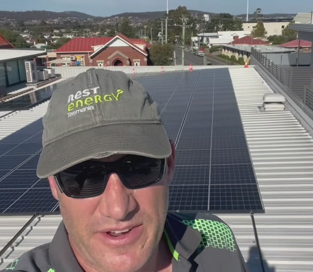 George from REST Energy on the Salamanca Fresh Bellerive roof with the 100kW array